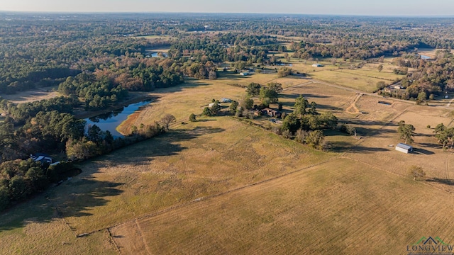 bird's eye view with a water view and a rural view