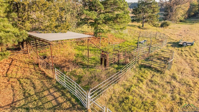 birds eye view of property with a rural view