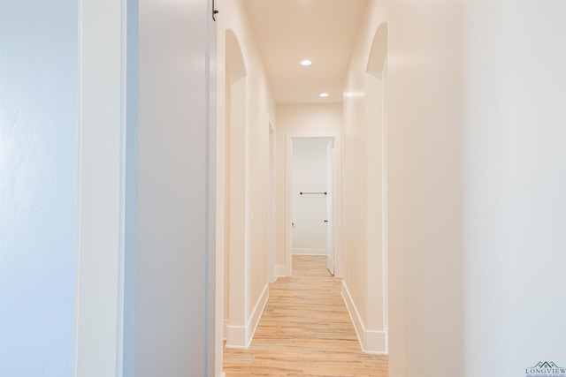 hallway with light wood-type flooring