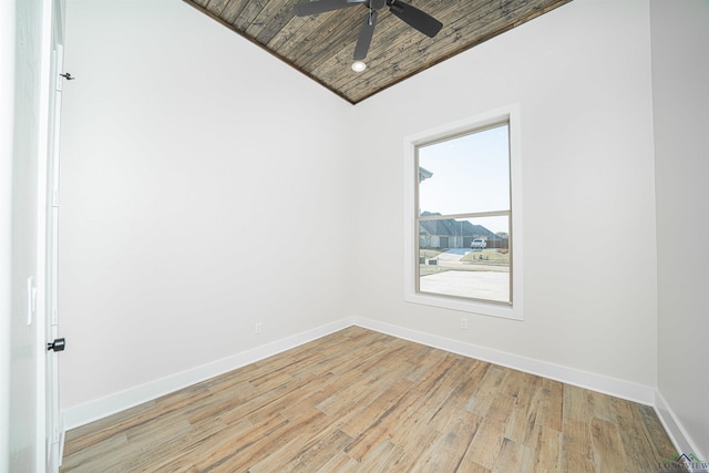 empty room with light hardwood / wood-style floors, vaulted ceiling, ceiling fan, and wood ceiling