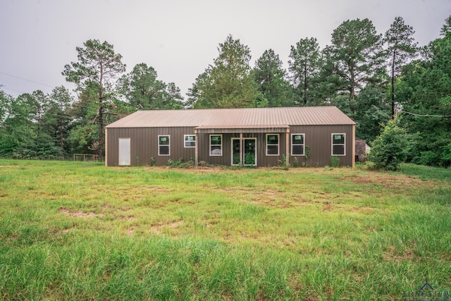 ranch-style house with a front yard