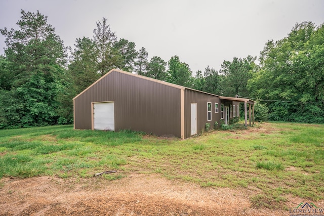 view of outdoor structure featuring a garage