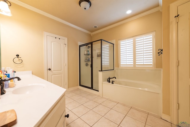 bathroom with tile patterned floors, vanity, plus walk in shower, and ornamental molding