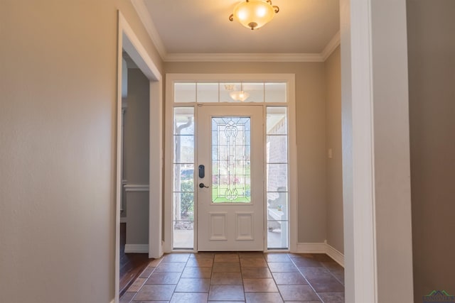 foyer featuring crown molding