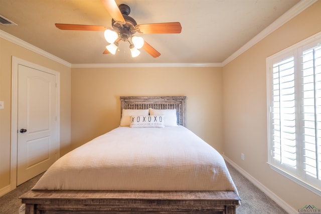 bedroom with carpet flooring, ceiling fan, and ornamental molding