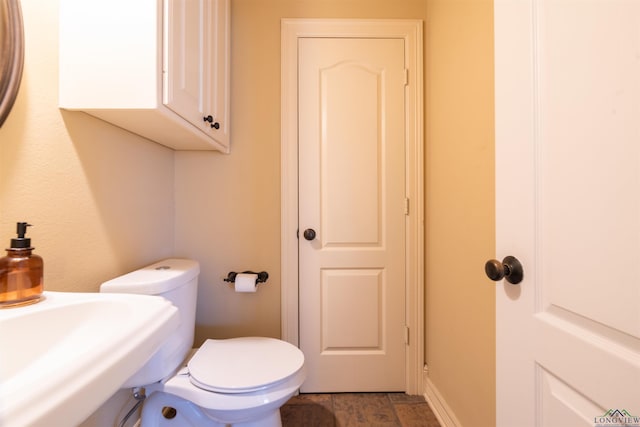 bathroom with sink and toilet