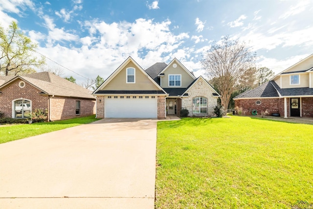 view of front facade with a garage and a front lawn