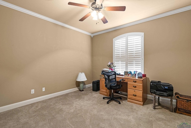 carpeted office space with ceiling fan and ornamental molding