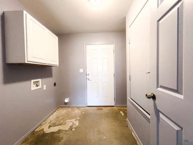 clothes washing area with hookup for an electric dryer, cabinets, and hookup for a washing machine