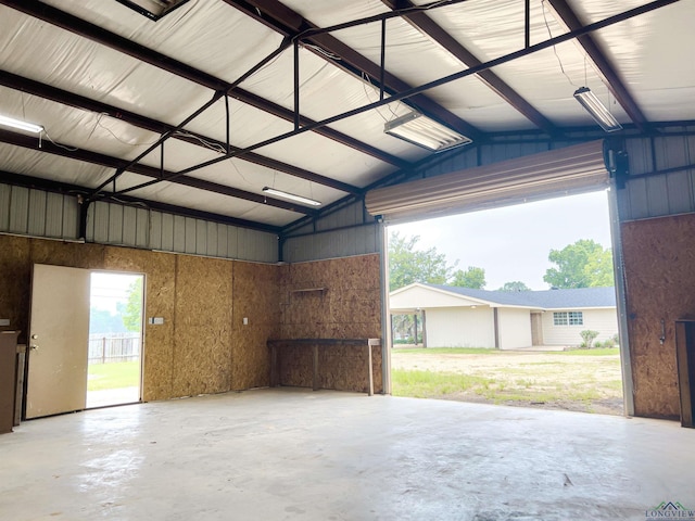 garage with wood walls