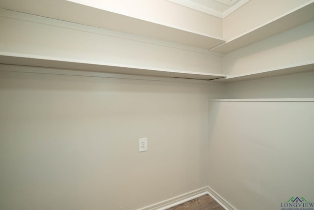 601 Wood St, Gladewater, TX 75647 - walk in closet with wood finished floors