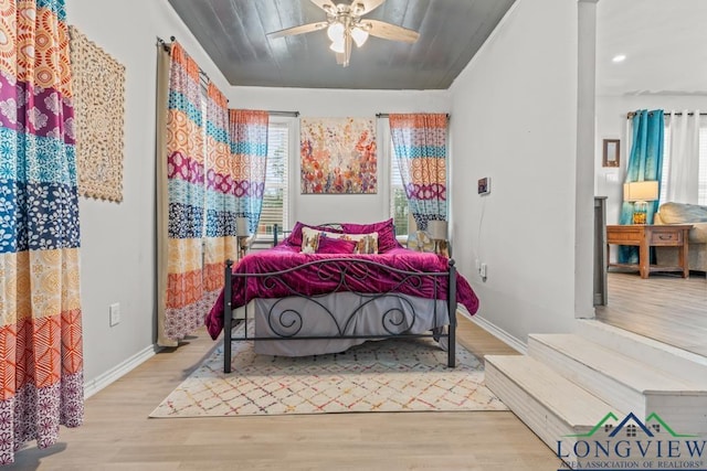 718 Pine St, Gilmer, TX 75644 - bedroom featuring a ceiling fan, wood finished floors, baseboards, and recessed lighting