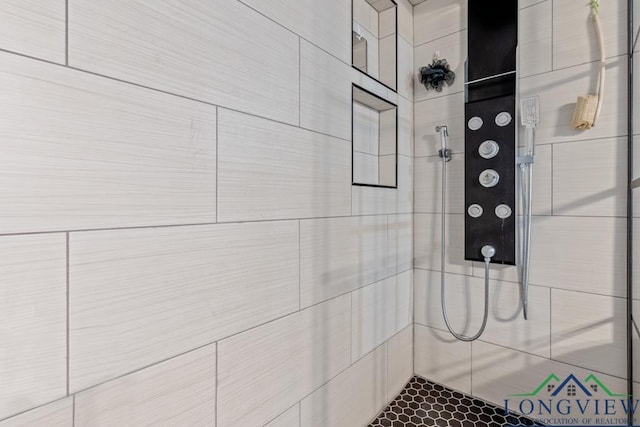 718 Pine St, Gilmer, TX 75644 - bathroom with a tile shower