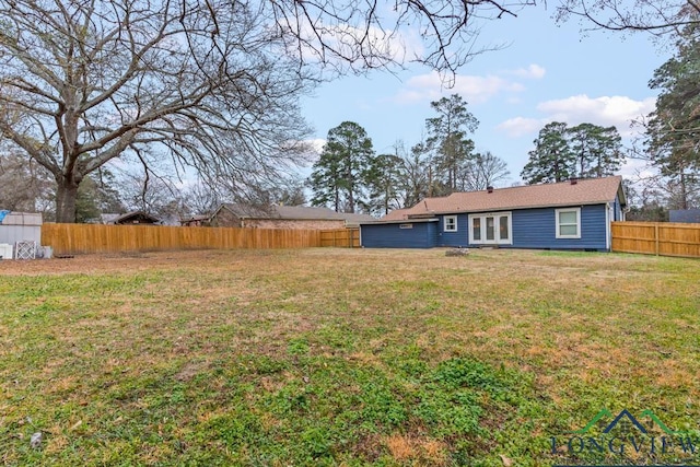 718 Pine St, Gilmer, TX 75644 - view of yard with a fenced backyard