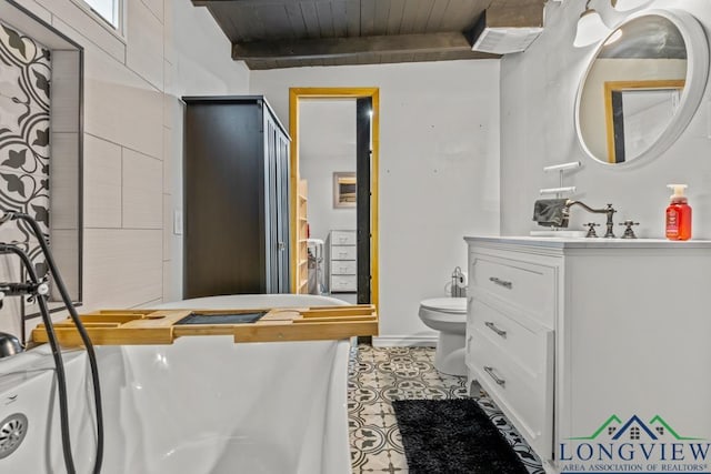 718 Pine St, Gilmer, TX 75644 - full bathroom featuring toilet, vanity, beam ceiling, and wooden ceiling