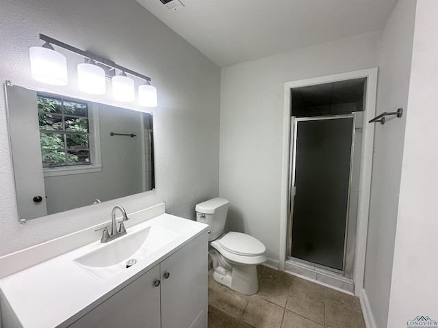 3401 Cooper Ln, Texarkana, TX 75503 - full bathroom with toilet, vanity, a stall shower, and tile patterned floors