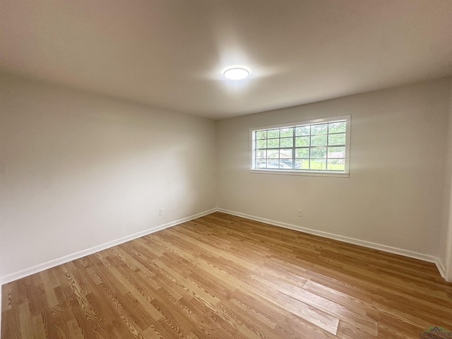 3401 Cooper Ln, Texarkana, TX 75503 - spare room with baseboards and light wood-style floors