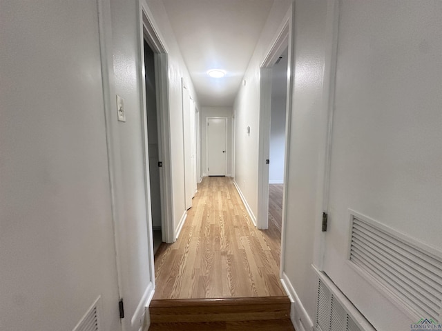 3401 Cooper Ln, Texarkana, TX 75503 - hall featuring light wood finished floors and baseboards