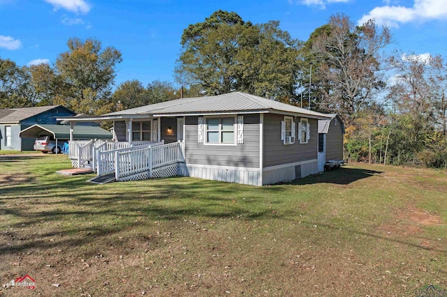 view of front of home with a front yard