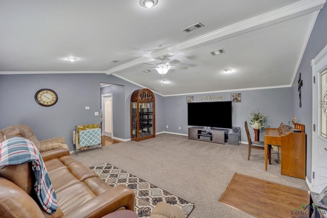 living room with carpet floors, crown molding, ceiling fan, and vaulted ceiling