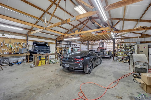 garage featuring a workshop area