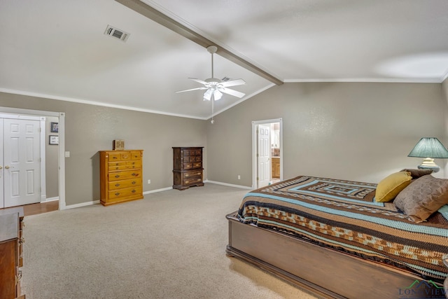 carpeted bedroom with vaulted ceiling with beams, ensuite bathroom, ceiling fan, and crown molding