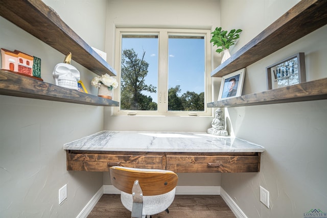 interior space with hardwood / wood-style flooring