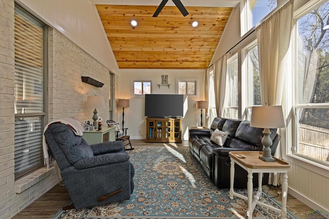 living room featuring lofted ceiling, hardwood / wood-style flooring, ceiling fan, and wooden ceiling