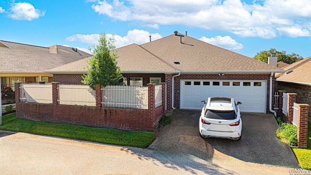 ranch-style home with a garage