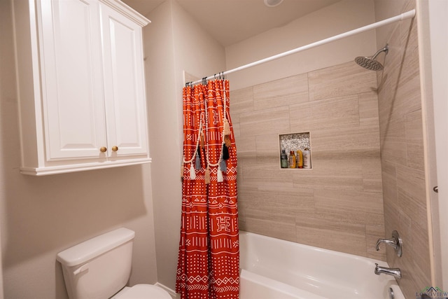 bathroom featuring shower / tub combo with curtain and toilet