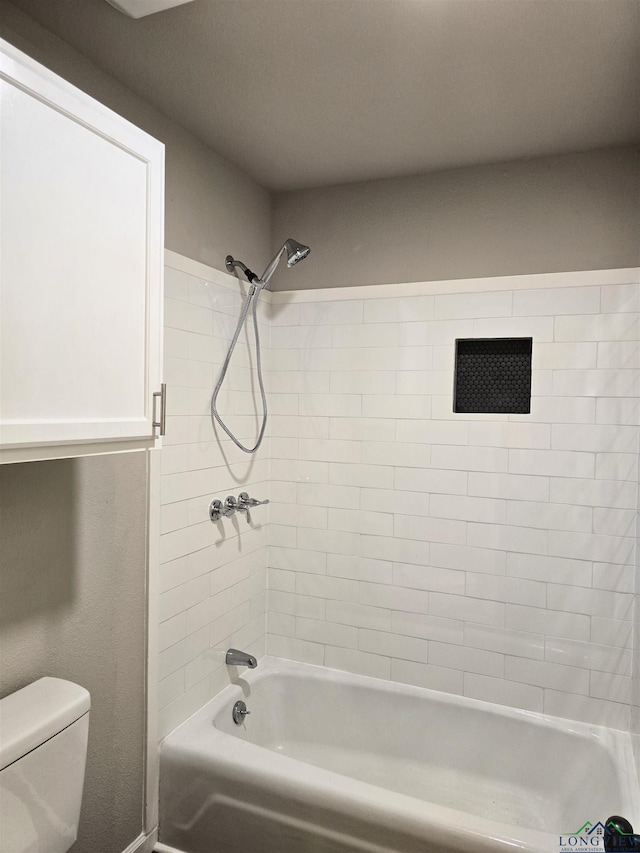 2013 E Warwick Cir, Longview, TX 75601 - bathroom with bathtub / shower combination and toilet