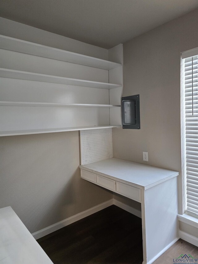 2013 E Warwick Cir, Longview, TX 75601 - unfurnished office featuring electric panel and light wood-style floors