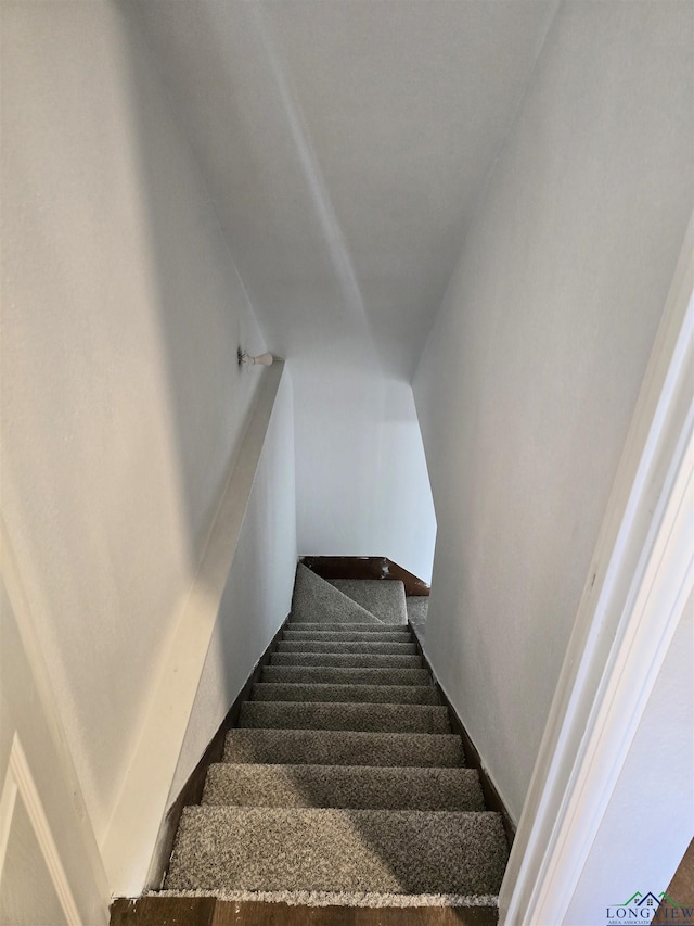 2013 E Warwick Cir, Longview, TX 75601 - stairs featuring carpet and baseboards