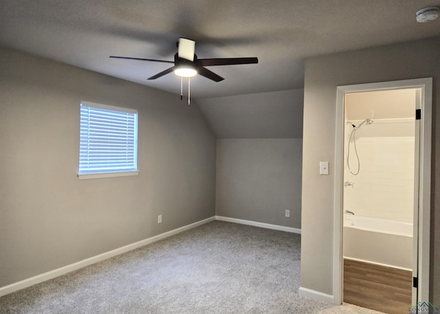 2013 E Warwick Cir, Longview, TX 75601 - bonus room featuring a ceiling fan, carpet flooring, and lofted ceiling