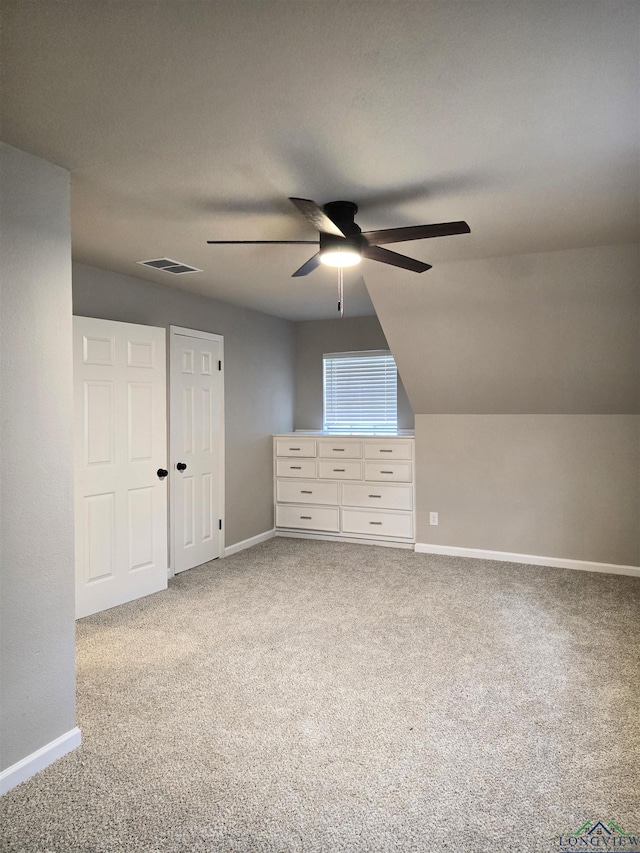 2013 E Warwick Cir, Longview, TX 75601 - additional living space with a ceiling fan, carpet, and lofted ceiling