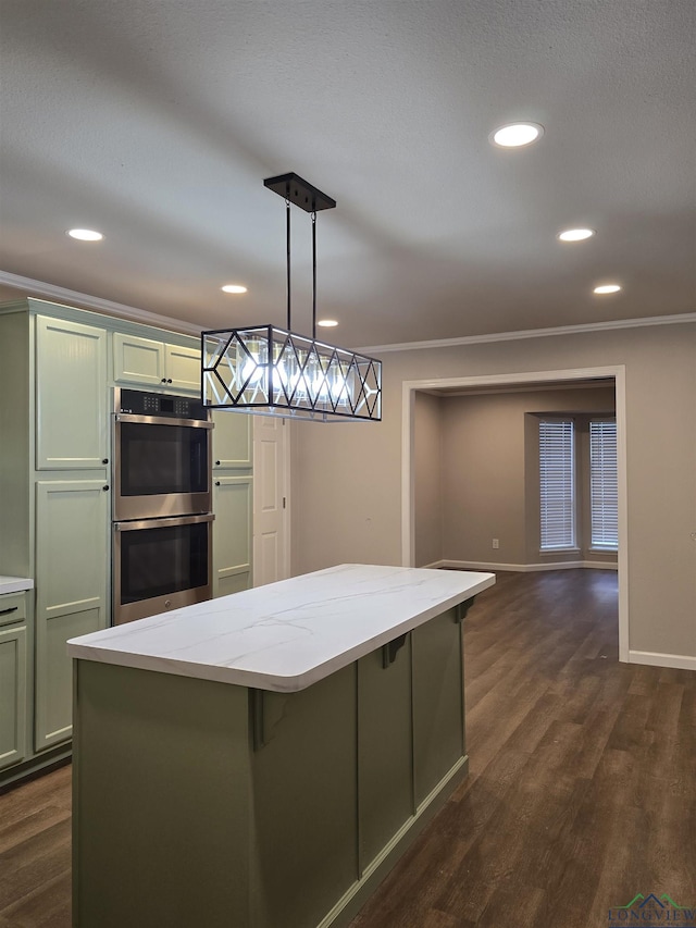 2013 E Warwick Cir, Longview, TX 75601 - kitchen with double oven, green cabinets, dark wood-style floors, light stone counters, and recessed lighting