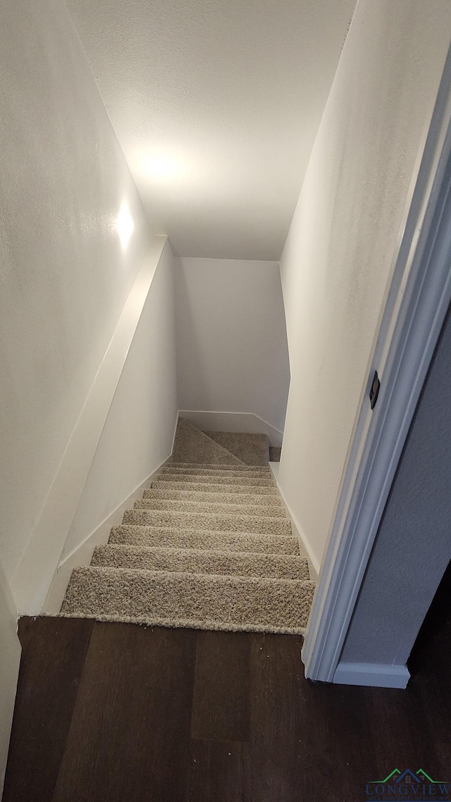 2013 E Warwick Cir, Longview, TX 75601 - stairs with wood finished floors and lofted ceiling