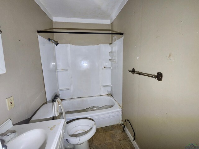 full bathroom with shower / bathing tub combination, toilet, ornamental molding, and sink