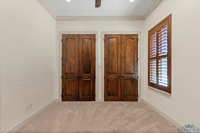 110 Rimrock Ln, Longview, TX 75605 - unfurnished bedroom featuring carpet, crown molding, baseboards, and a ceiling fan