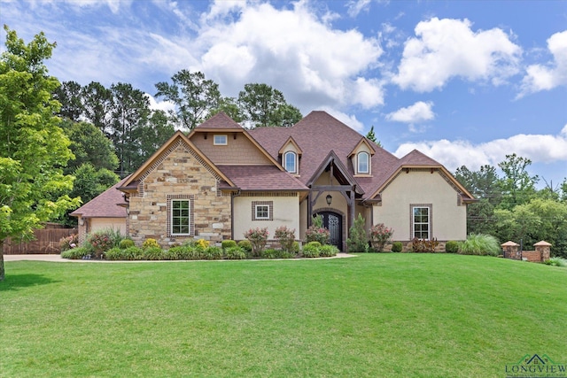 110 Rimrock Ln, Longview, TX 75605 - french country home with stone siding, stucco siding, and a shingled roof