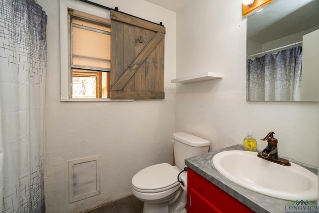 full bathroom with vanity and toilet