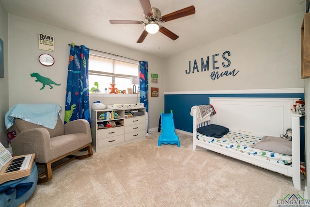 carpeted bedroom with ceiling fan