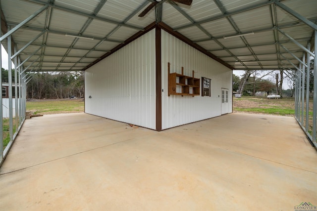 exterior space with ceiling fan