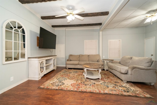 living room featuring beamed ceiling, ceiling fan, and dark hardwood / wood-style floors