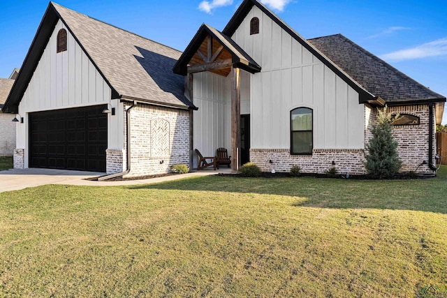 modern farmhouse with a garage and a front lawn