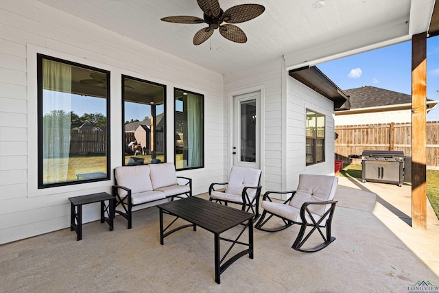 view of patio featuring ceiling fan, a grill, and an outdoor hangout area