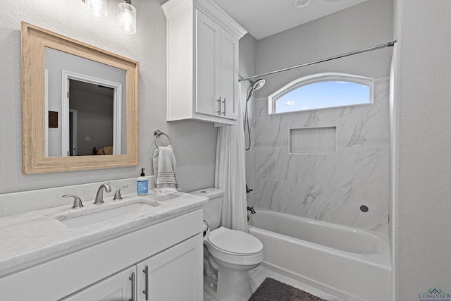 full bathroom featuring vanity, toilet, and shower / tub combo