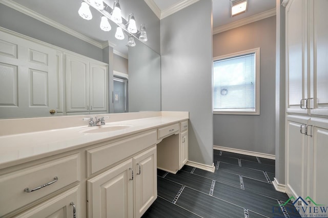 bathroom featuring crown molding and vanity