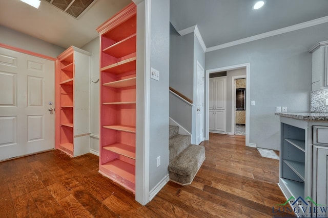 walk in closet featuring dark hardwood / wood-style flooring