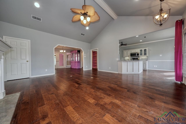 unfurnished living room featuring beamed ceiling, high vaulted ceiling, dark hardwood / wood-style flooring, and ceiling fan with notable chandelier